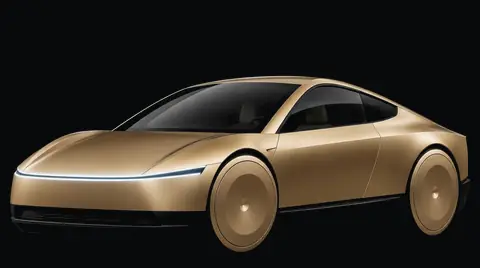 A gold Tesla Cybercab